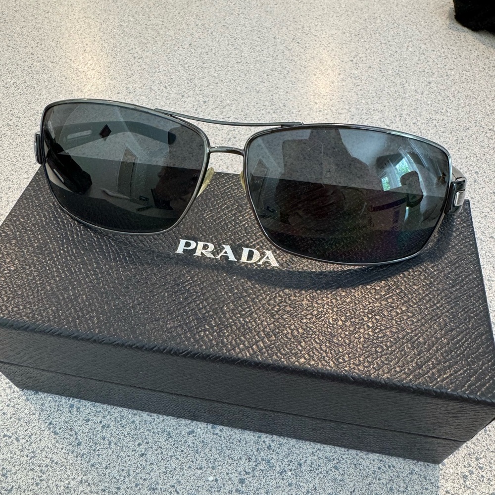 men Prada sunglasses used but excellent condition.